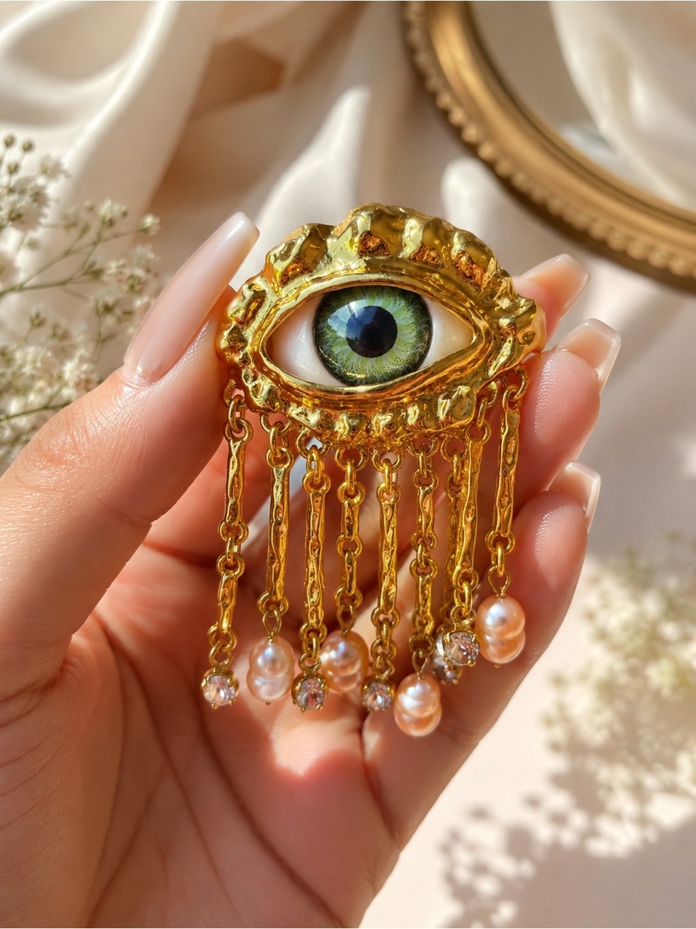 Gold Eye Drop Pearl Fringe Brooch